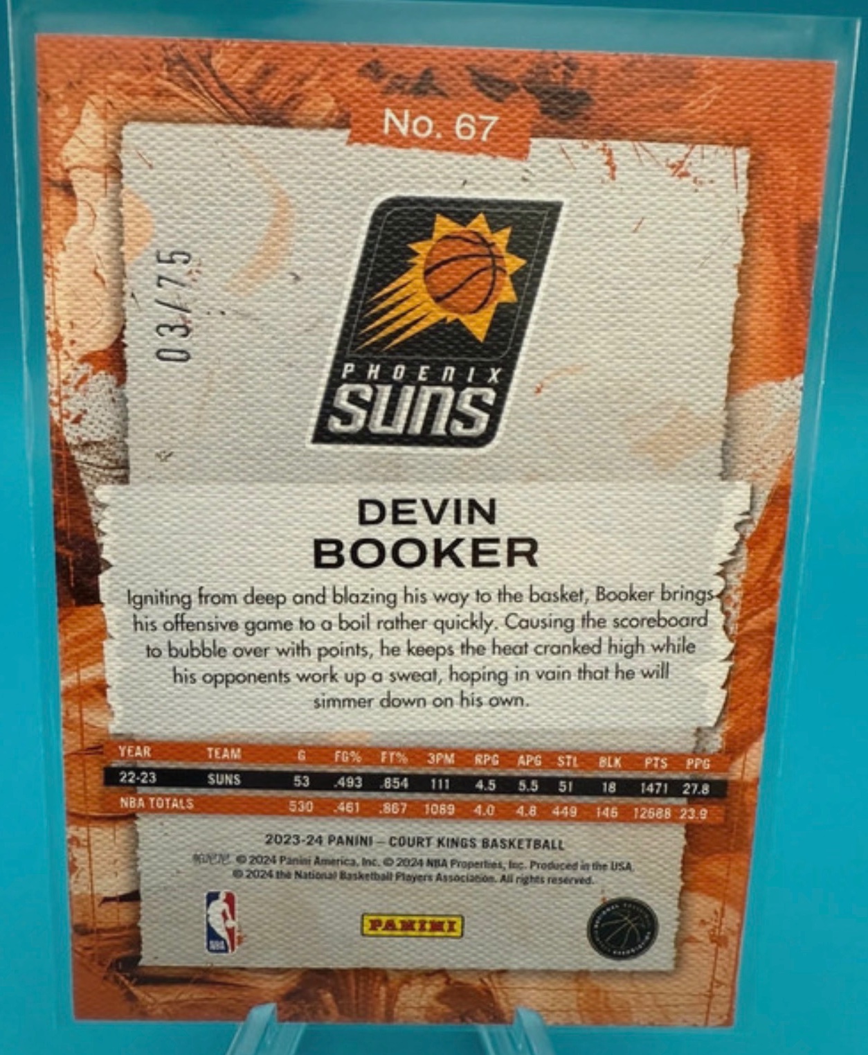 Devin Booker 2023-24 Panini Court Kings Orange parallel #67 Card back